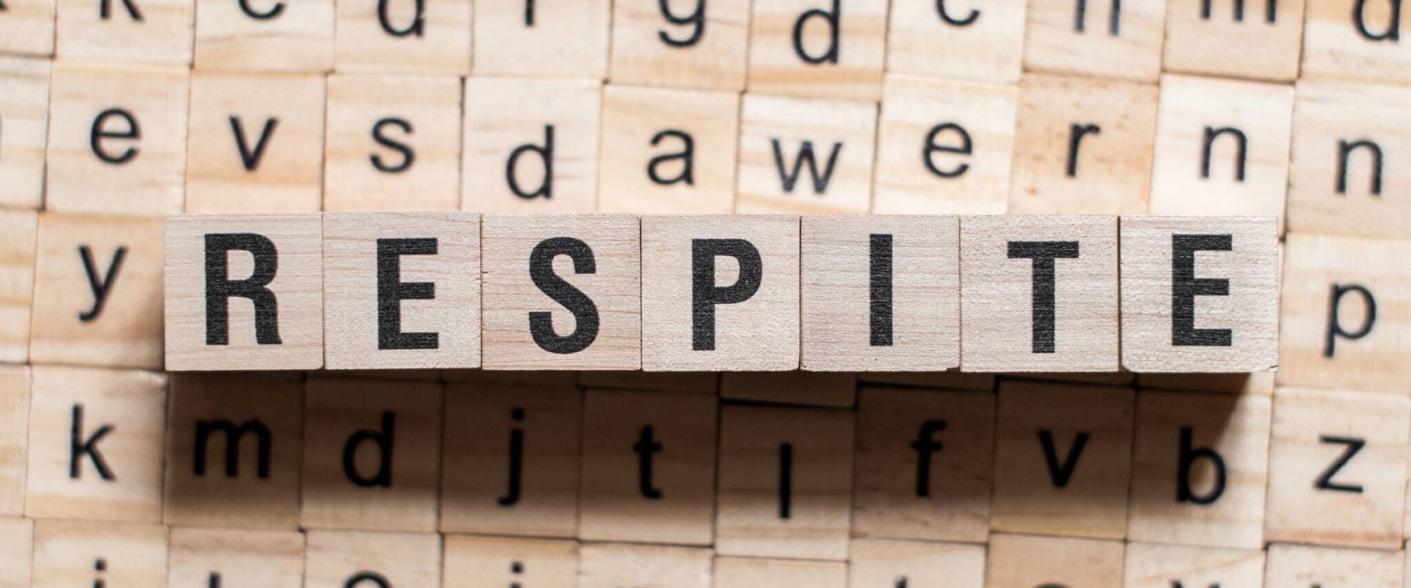 wood cubes that spell out respite care