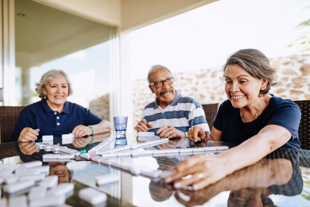 residents playing dominoes