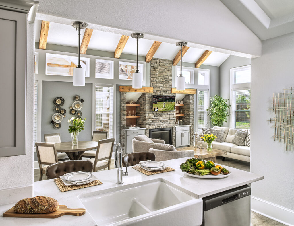 A photo from the kitchen area of a single story home with an open concept floor plan