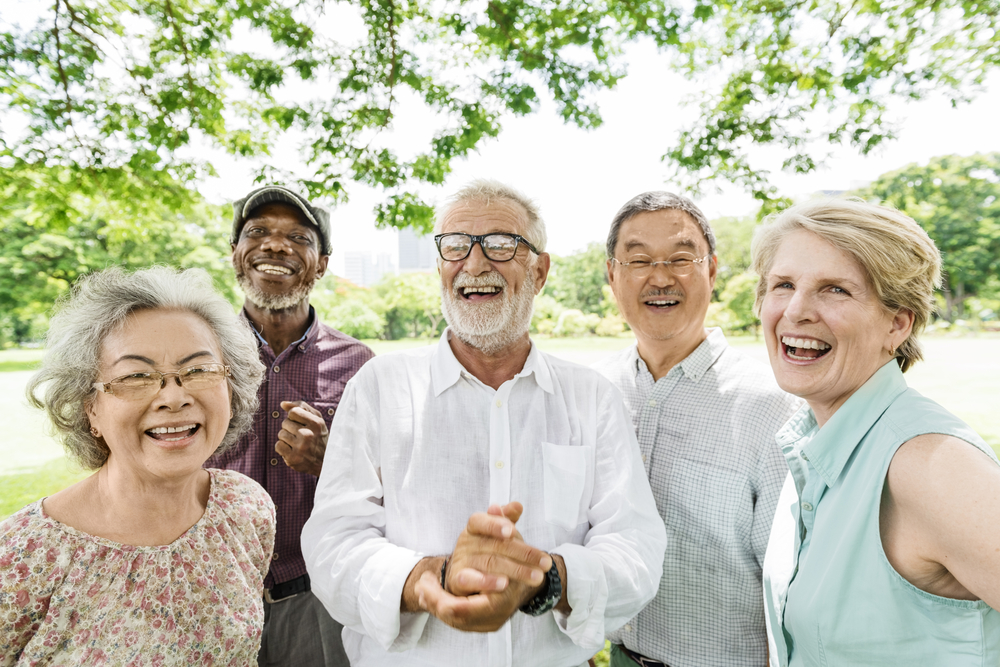 people laughing together outside