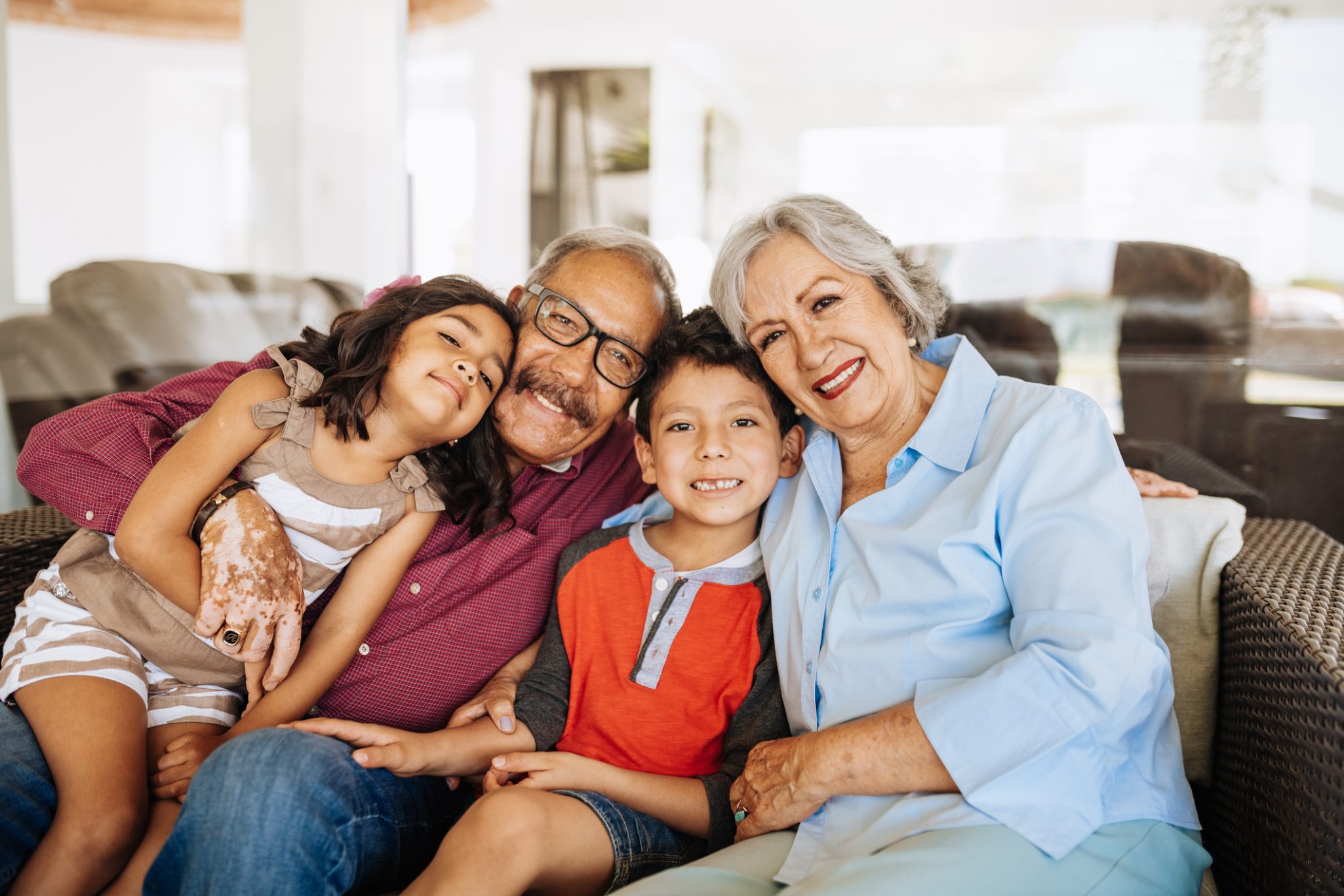 Grandparents and grandchildren – Latin/Hispanic family together. Grandparents smiling with grandchildren