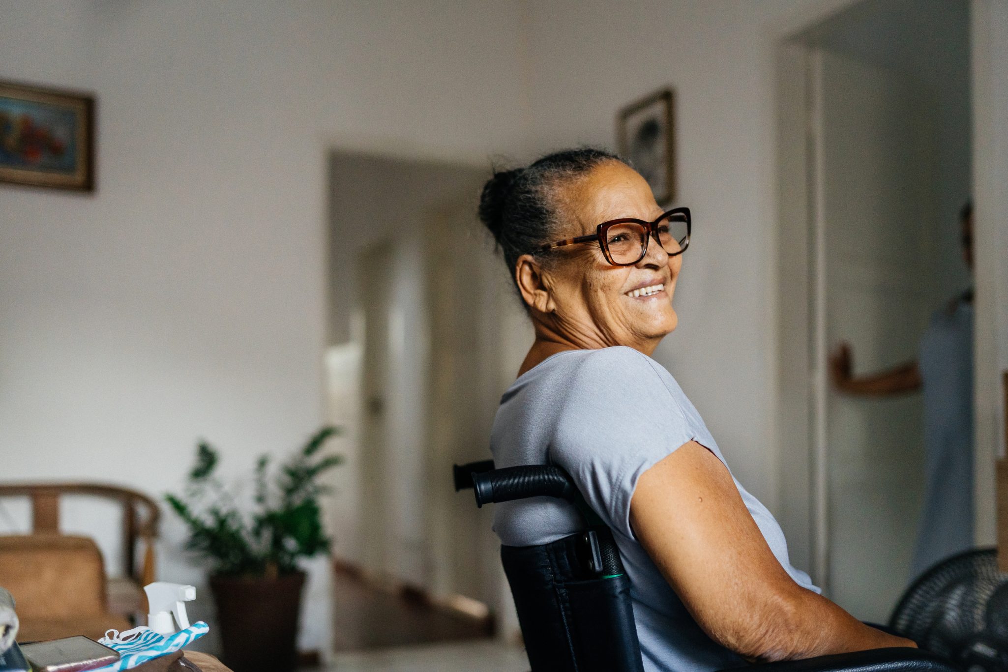 Smiling senior woman in wheelchair